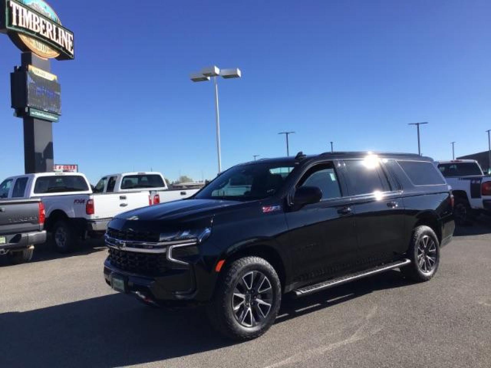 2022 Black /Jet Black Chevrolet Suburban Z71 (1GNSKDKDXNR) with an 5.3L V8 OHV 16V engine, 10-Speed Automatic transmission, located at 1235 N Woodruff Ave., Idaho Falls, 83401, (208) 523-1053, 43.507172, -112.000488 - This 2022 Chevrolet Suburban LT Z71, has the 5.3L V8 motor. It only has 35,683 miles. Comes with leather seats, both fronts seats are powered, heated seats, remote start, back up camera, lane assist, rear climate control, Bose stereo system, Running boards , and it has a towing package. At Timberlin - Photo #0