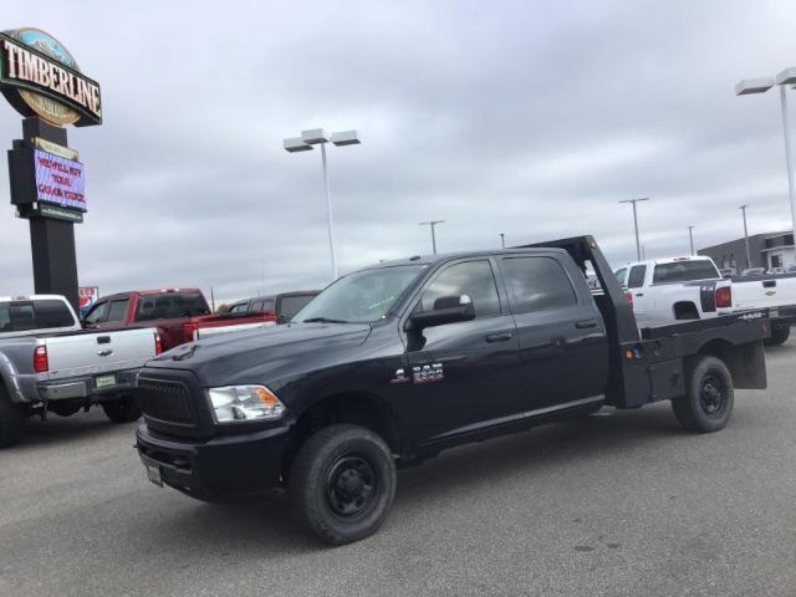2016 GRAY /Black/Diesel Gray, cloth RAM 2500 Tradesman Crew Cab LWB 4WD (3C6UR5HL2GG) with an 6.7L L6 OHV 24V TURBO DIESEL engine, 6-Speed Automatic transmission, located at 1235 N Woodruff Ave., Idaho Falls, 83401, (208) 523-1053, 43.507172, -112.000488 - This 2016 Ram 2500 Tradesman, has the 6.7L diesel motor. It has 108,248 miles. It has cloth interior, bluetooth audio, and integrated brake control. At Timberline Auto it is always easy to find a great deal on your next vehicle! Our experienced sales staff can help find the right vehicle that will f - Photo #0