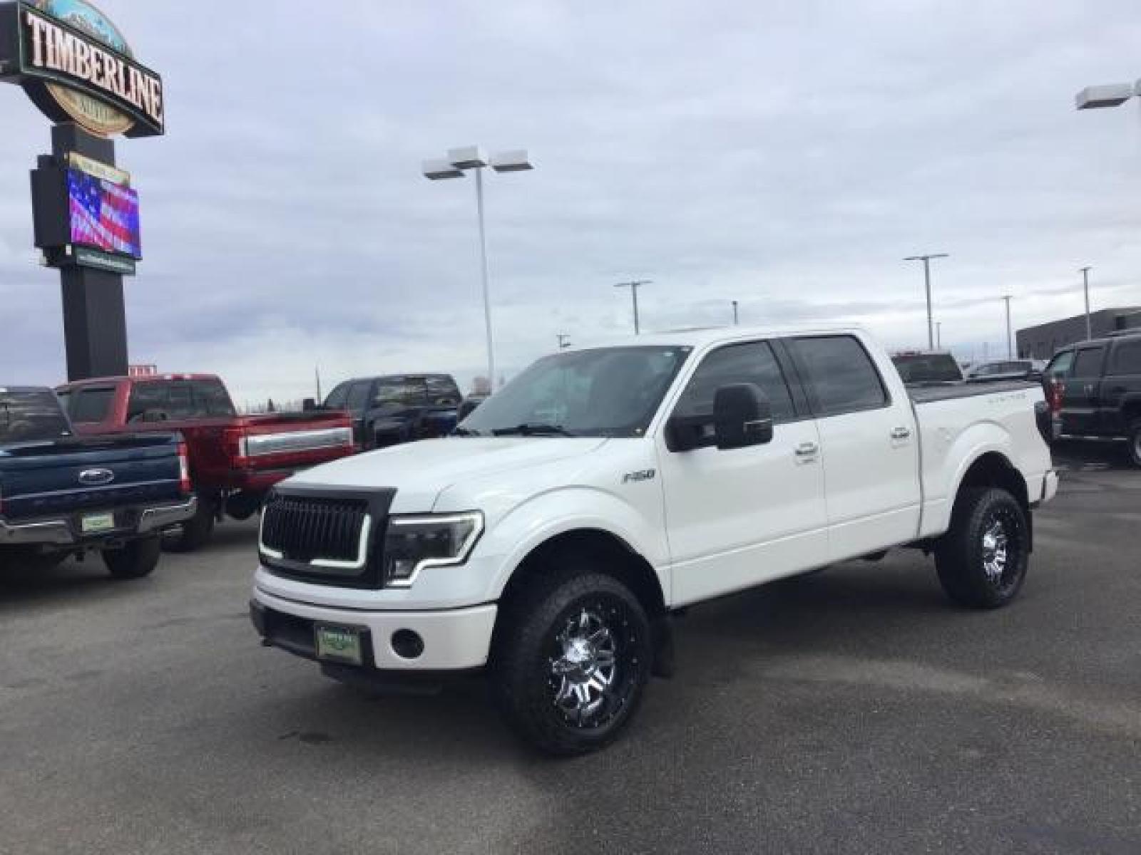 2014 White Platinum Met TC /Black Ford F-150 Platinum SuperCrew 6.5-ft. Bed 4WD (1FTFW1ET2EF) with an 3.5L V6 TURBO engine, 6-Speed Automatic transmission, located at 1235 N Woodruff Ave., Idaho Falls, 83401, (208) 523-1053, 43.507172, -112.000488 - This 2014 Ford F150 Limited, has the 3.5L ecoboost motor. It has 86,000 miles. It comes with leather interior, heated and cooled seats, dual power seats, back up camera, sunroof, and remote start. At Timberline Auto it is always easy to find a great deal on your next vehicle! Our experienced sales s - Photo #0