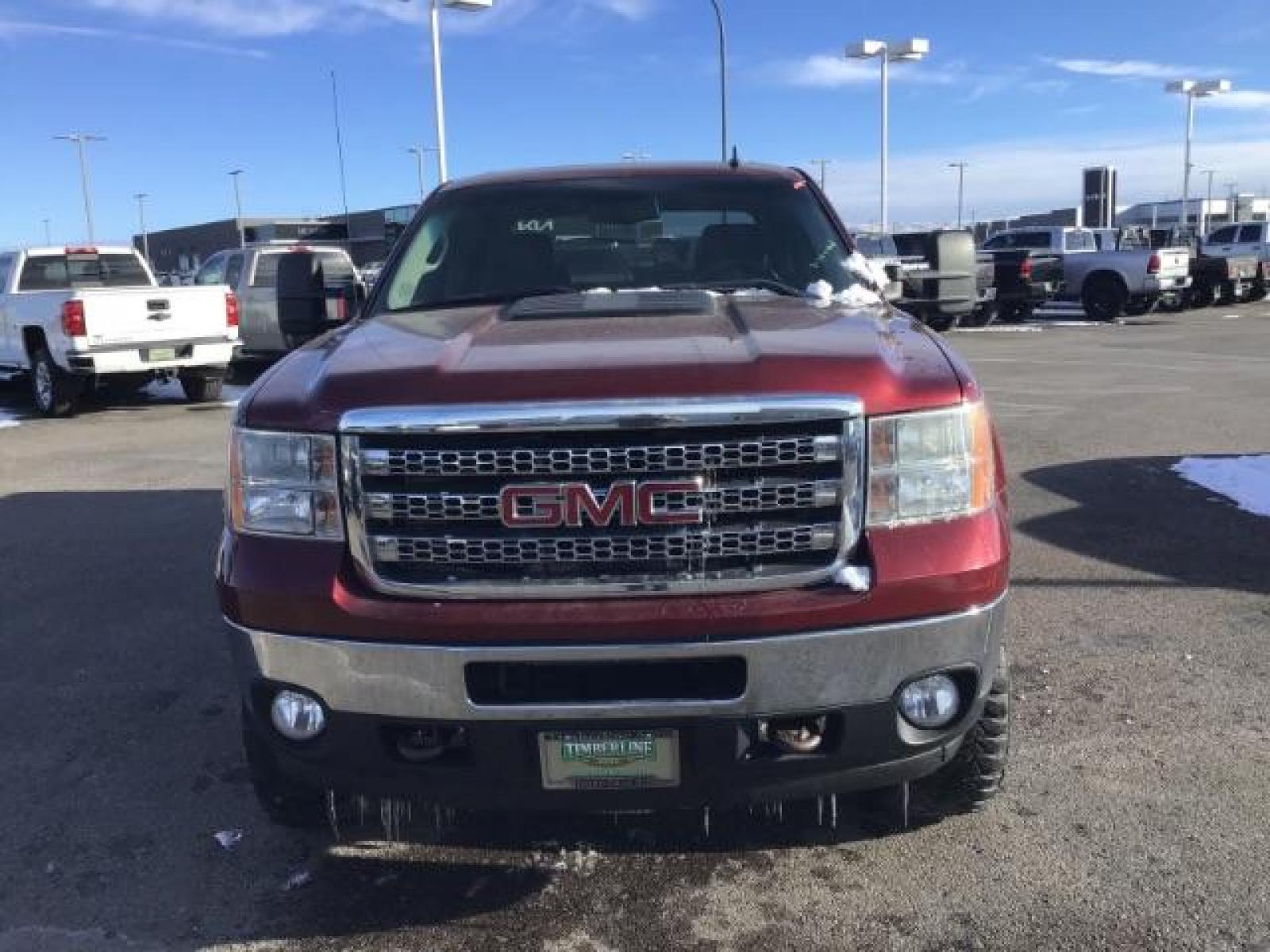2013 Sonoma Red Metallic /Dark Titanium/Light Titanium Leather Interior GMC Sierra 2500HD SLT Crew Cab 4WD (1GT121C81DF) with an 6.6L V8 OHV 32V TURBO DIESEL engine, 6-Speed Automatic transmission, located at 1235 N Woodruff Ave., Idaho Falls, 83401, (208) 523-1053, 43.507172, -112.000488 - This 2013 GMC Sierra SLT 4x4, has the 6.6L duramax motor. It has 124,000 miles. Comes with leather interior, heated seats, blue tooth, dual power seats, key less remote, and turn over ball. At Timberline Auto it is always easy to find a great deal on your next vehicle! Our experienced sales staff ca - Photo #7