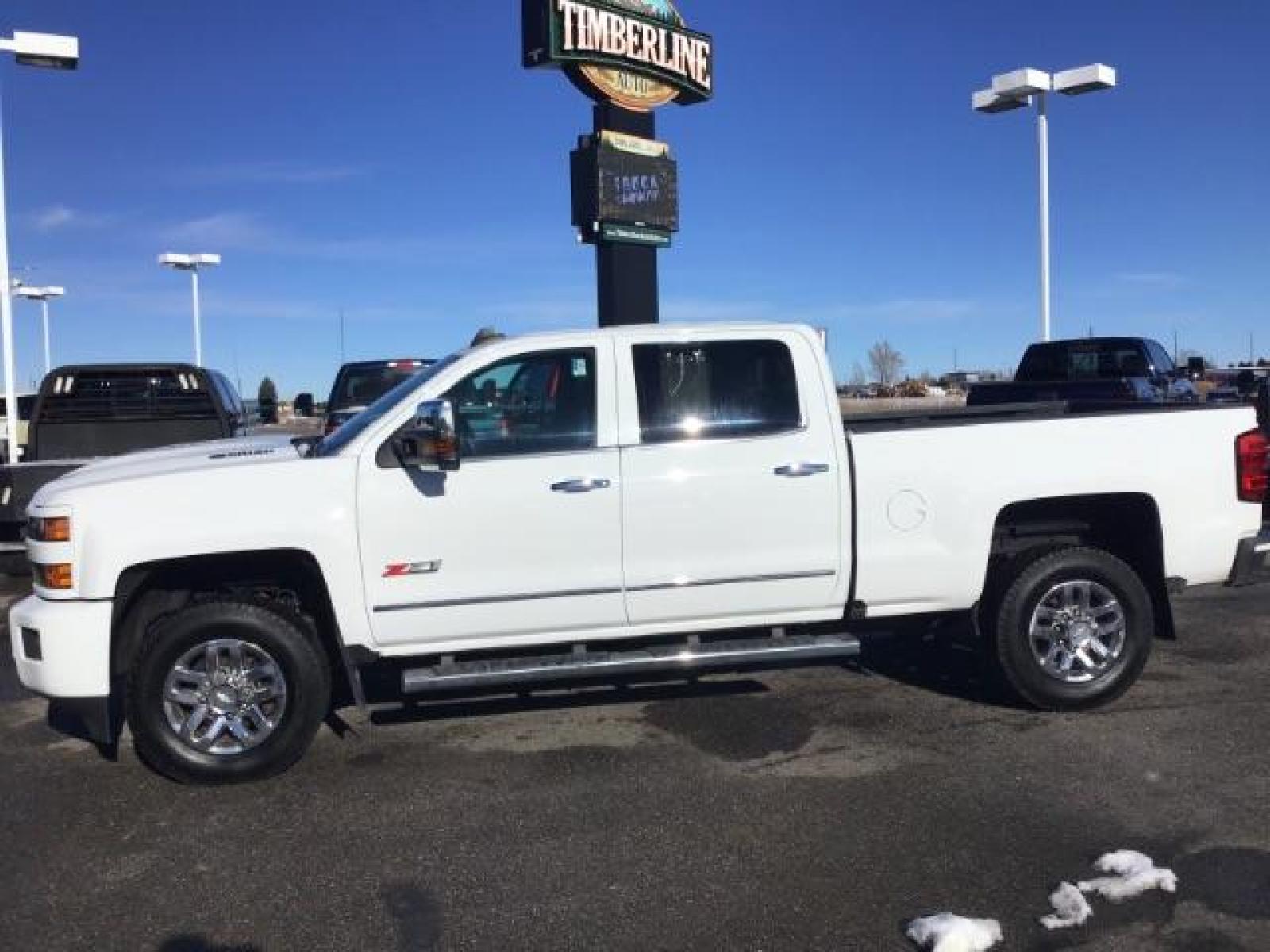 2017 Summit White /Jet Black, leather Chevrolet Silverado 3500HD LTZ Crew Cab 4WD (1GC4K0CY2HF) with an 6.6L V8 OHV 32V TURBO DIESEL engine, 6-Speed Automatic transmission, located at 1235 N Woodruff Ave., Idaho Falls, 83401, (208) 523-1053, 43.507172, -112.000488 - This 2017 Chevrolet 3500HD 4x4 Z71 LTZ, has the 6.6L diesel motor. It has 42,847 miles. It has leather interior, heated seats, sunroof, spray in bedliner, back up camera, also comes with a turnover ball. At Timberline Auto it is always easy to find a great deal on your next vehicle! Our experienced - Photo #1
