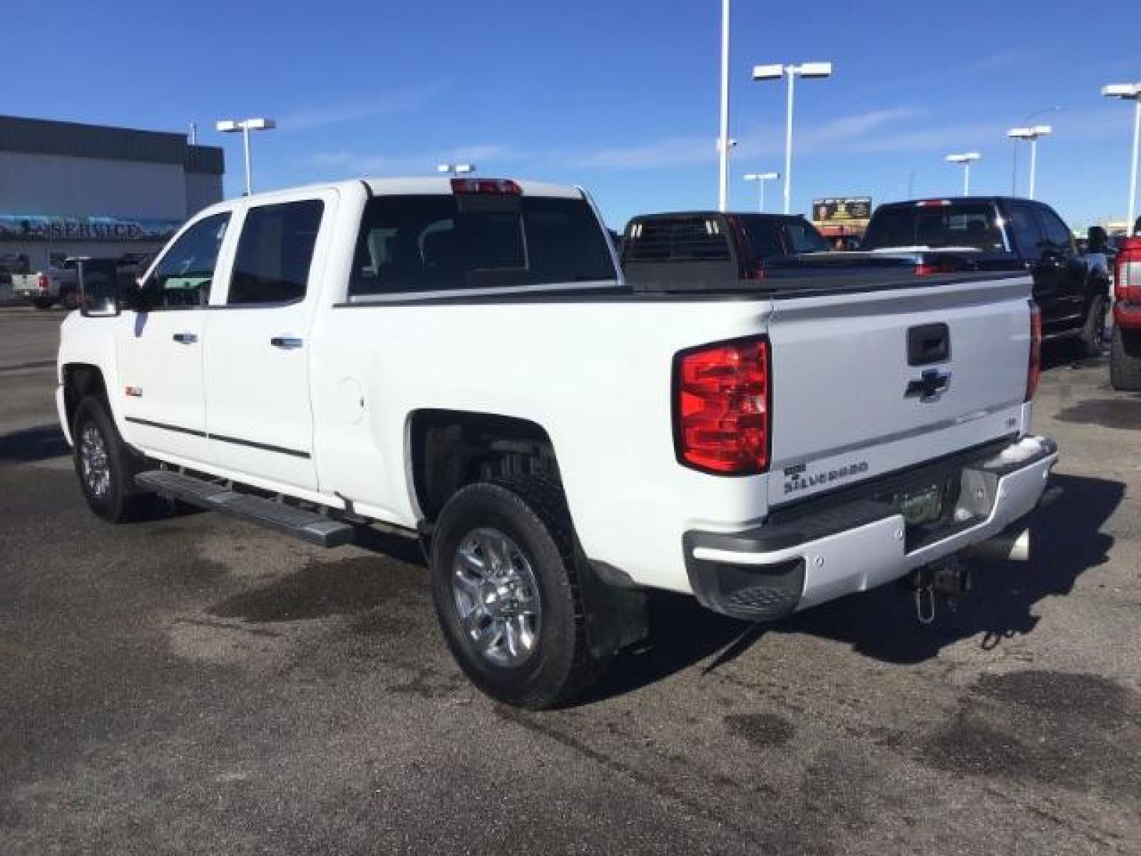 2017 Summit White /Jet Black, leather Chevrolet Silverado 3500HD LTZ Crew Cab 4WD (1GC4K0CY2HF) with an 6.6L V8 OHV 32V TURBO DIESEL engine, 6-Speed Automatic transmission, located at 1235 N Woodruff Ave., Idaho Falls, 83401, (208) 523-1053, 43.507172, -112.000488 - This 2017 Chevrolet 3500HD 4x4 Z71 LTZ, has the 6.6L diesel motor. It has 42,847 miles. It has leather interior, heated seats, sunroof, spray in bedliner, back up camera, also comes with a turnover ball. At Timberline Auto it is always easy to find a great deal on your next vehicle! Our experienced - Photo #2
