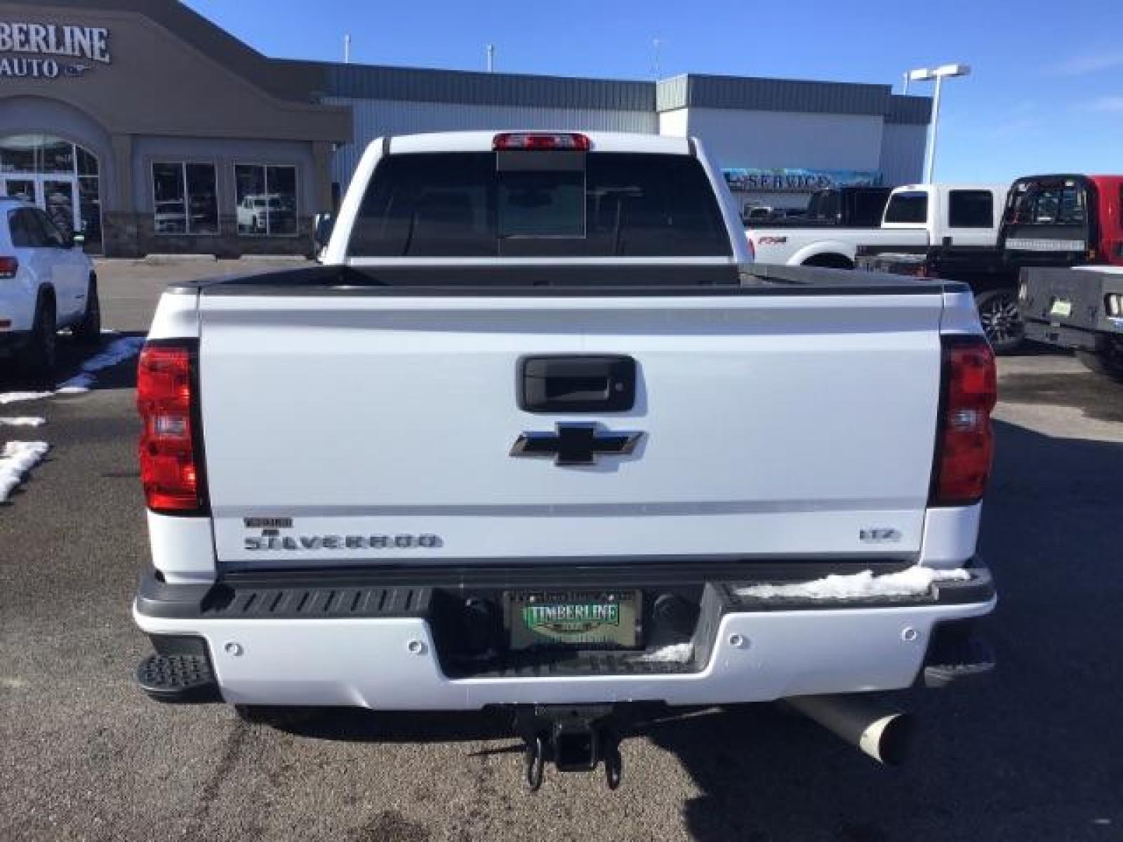 2017 Summit White /Jet Black, leather Chevrolet Silverado 3500HD LTZ Crew Cab 4WD (1GC4K0CY2HF) with an 6.6L V8 OHV 32V TURBO DIESEL engine, 6-Speed Automatic transmission, located at 1235 N Woodruff Ave., Idaho Falls, 83401, (208) 523-1053, 43.507172, -112.000488 - This 2017 Chevrolet 3500HD 4x4 Z71 LTZ, has the 6.6L diesel motor. It has 42,847 miles. It has leather interior, heated seats, sunroof, spray in bedliner, back up camera, also comes with a turnover ball. At Timberline Auto it is always easy to find a great deal on your next vehicle! Our experienced - Photo #3