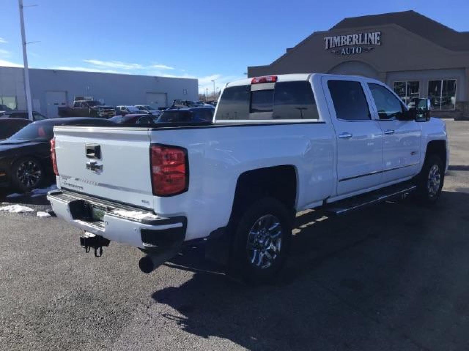 2017 Summit White /Jet Black, leather Chevrolet Silverado 3500HD LTZ Crew Cab 4WD (1GC4K0CY2HF) with an 6.6L V8 OHV 32V TURBO DIESEL engine, 6-Speed Automatic transmission, located at 1235 N Woodruff Ave., Idaho Falls, 83401, (208) 523-1053, 43.507172, -112.000488 - This 2017 Chevrolet 3500HD 4x4 Z71 LTZ, has the 6.6L diesel motor. It has 42,847 miles. It has leather interior, heated seats, sunroof, spray in bedliner, back up camera, also comes with a turnover ball. At Timberline Auto it is always easy to find a great deal on your next vehicle! Our experienced - Photo #4