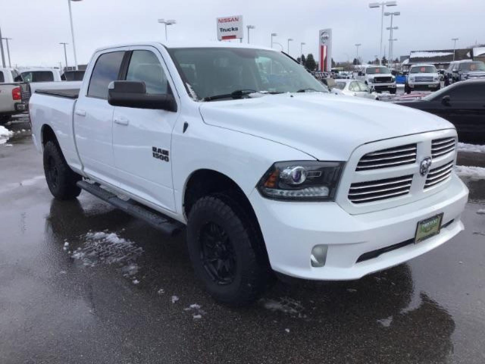 2014 Bright White Clearcoat /Black RAM 1500 Sport Crew Cab LWB 4WD (1C6RR7UT5ES) with an 5.7L V8 OHV 16V engine, 8-Speed Automatic transmission, located at 1235 N Woodruff Ave., Idaho Falls, 83401, (208) 523-1053, 43.507172, -112.000488 - Photo #6
