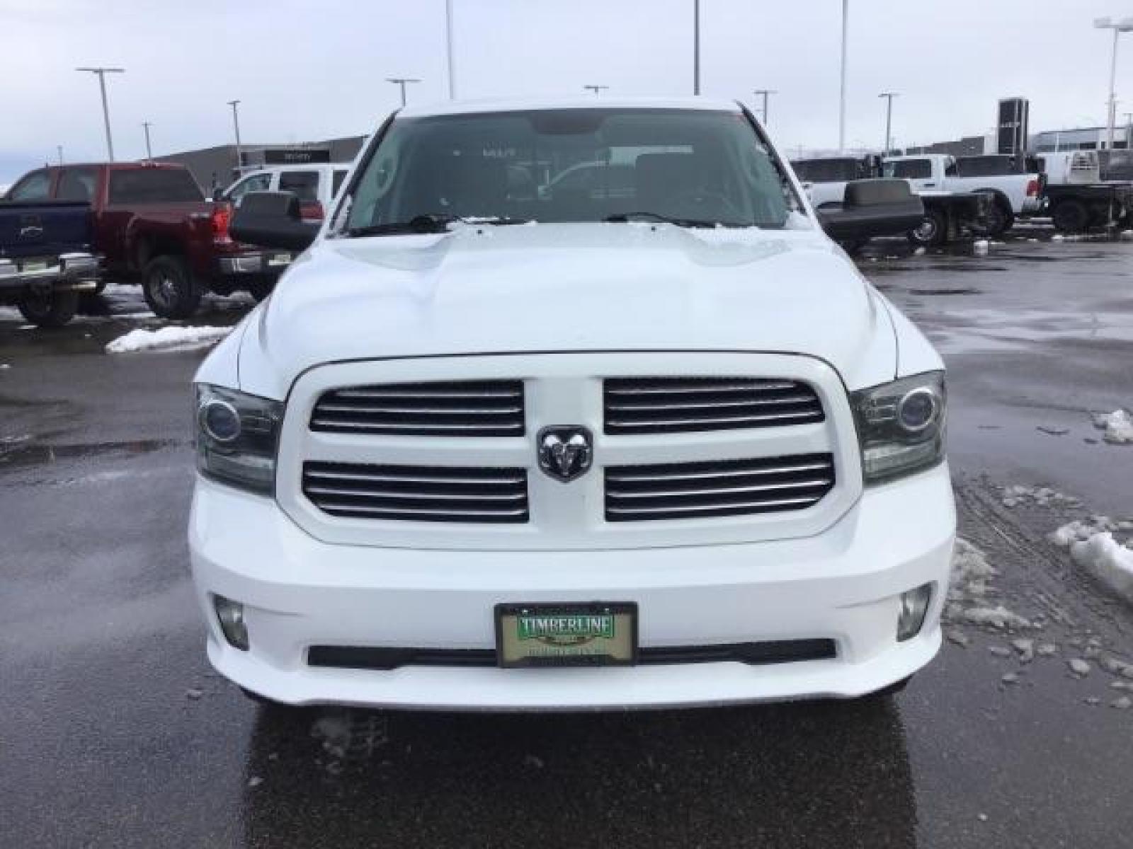 2014 Bright White Clearcoat /Black RAM 1500 Sport Crew Cab LWB 4WD (1C6RR7UT5ES) with an 5.7L V8 OHV 16V engine, 8-Speed Automatic transmission, located at 1235 N Woodruff Ave., Idaho Falls, 83401, (208) 523-1053, 43.507172, -112.000488 - Photo #7