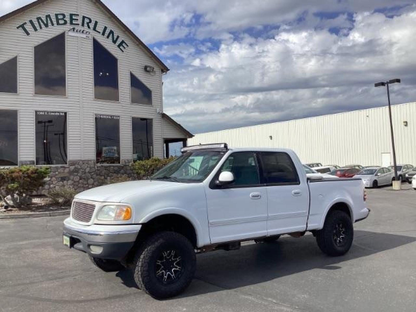 2001 WHITE /Medium Graphite Cloth Ford F-150 XLT SuperCrew 4WD (1FTRW08L51K) with an 5.4L V8 SOHC 16V engine, 4-Speed Automatic transmission, located at 1235 N Woodruff Ave., Idaho Falls, 83401, (208) 523-1053, 43.507172, -112.000488 - The 2001 Ford F-150 XLT 4x4 SuperCrew typically offers a range of features suitable for both work and everyday use. Here are some key features you can typically find in the 2001 Ford F-150 XLT 4x4 SuperCrew: Engine Options: The 2001 F-150 XLT SuperCrew usually offers a choice of engine options: 4. - Photo #1