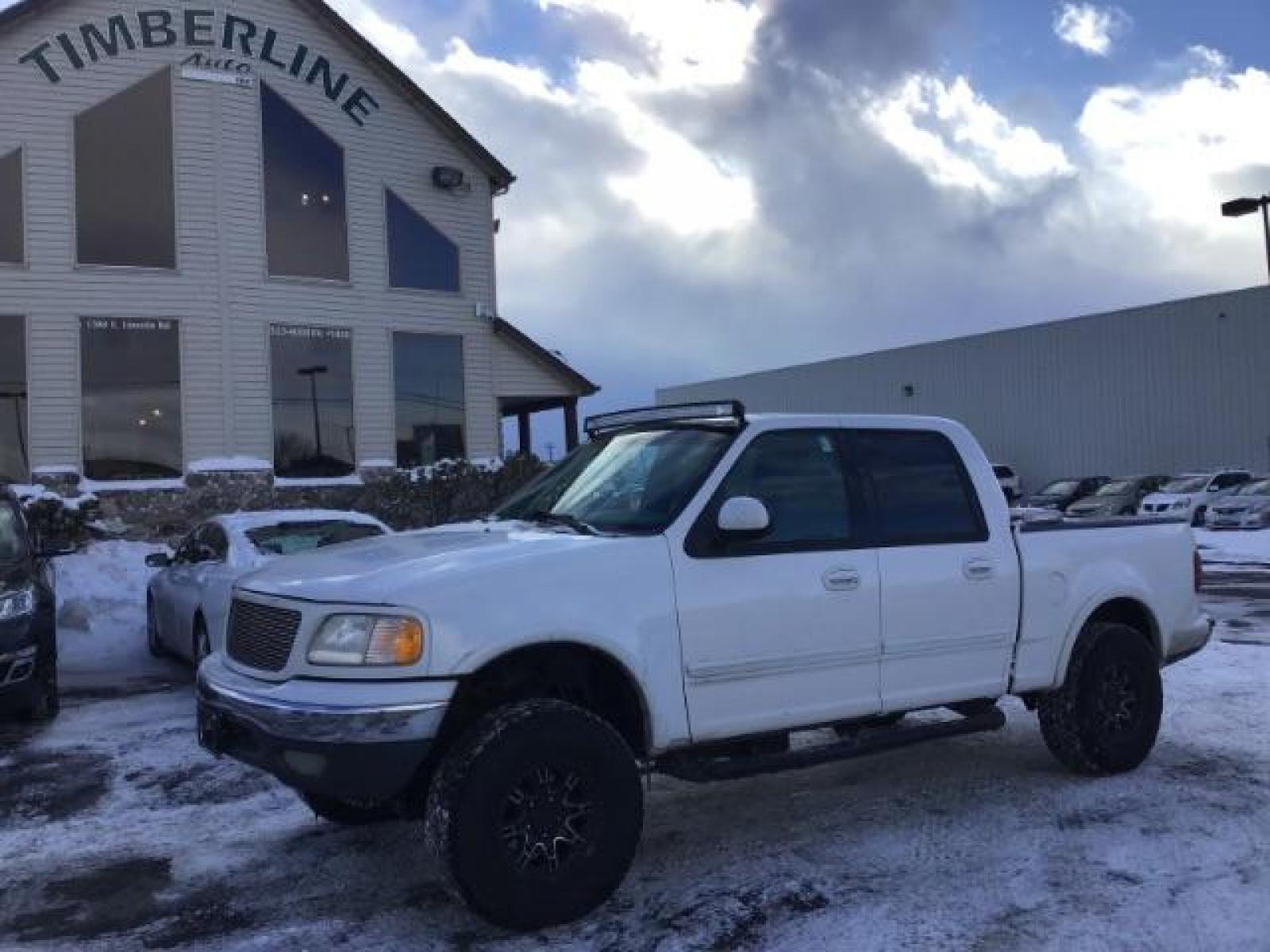 2001 WHITE /Medium Graphite Cloth Ford F-150 XLT SuperCrew 4WD (1FTRW08L51K) with an 5.4L V8 SOHC 16V engine, 4-Speed Automatic transmission, located at 1235 N Woodruff Ave., Idaho Falls, 83401, (208) 523-1053, 43.507172, -112.000488 - The 2001 Ford F-150 XLT 4x4 SuperCrew typically offers a range of features suitable for both work and everyday use. Here are some key features you can typically find in the 2001 Ford F-150 XLT 4x4 SuperCrew: Engine Options: The 2001 F-150 XLT SuperCrew usually offers a choice of engine options: 4. - Photo #0