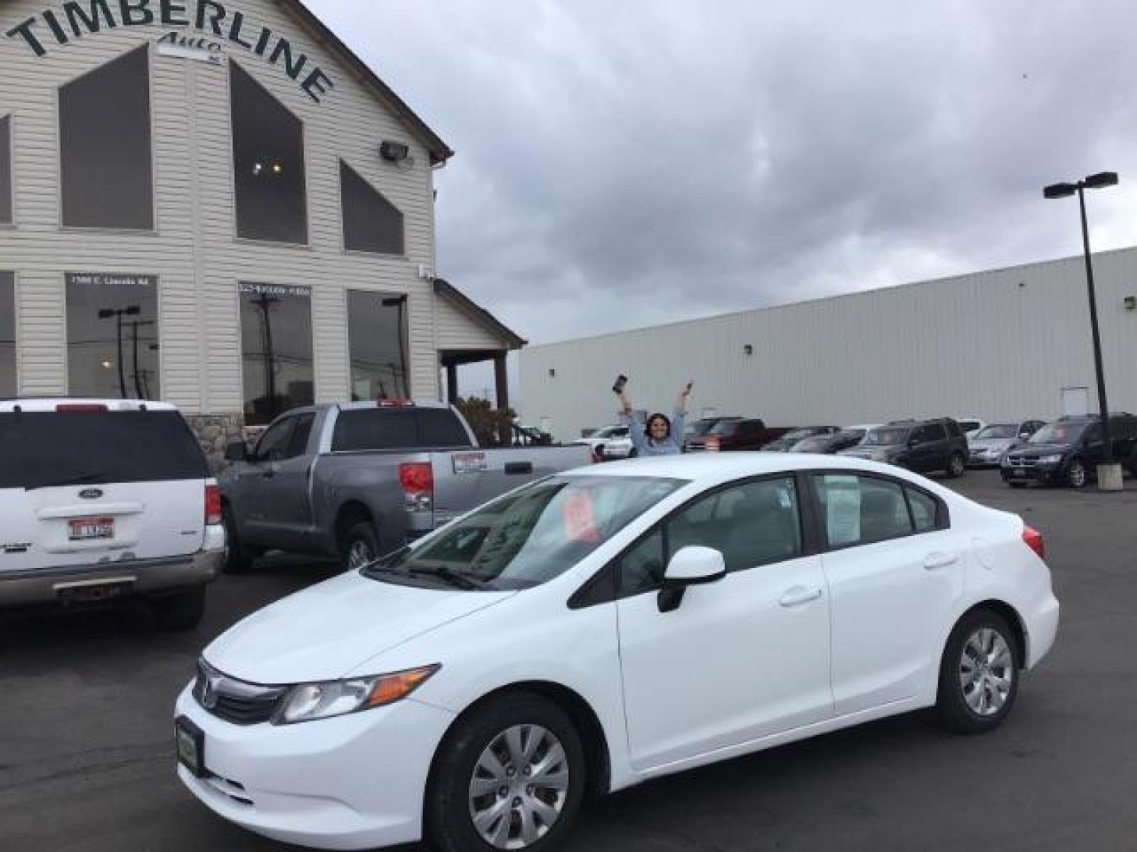 2012 Taffeta White /Gray Cloth Interior Honda Civic LX Sedan 5-Speed AT (19XFB2F54CE) with an 1.8L L4 SOHC 16V engine, 5-Speed Automatic transmission, located at 1235 N Woodruff Ave., Idaho Falls, 83401, (208) 523-1053, 43.507172, -112.000488 - This 2012 Honda Civic LX, has 98,000 miles. Comes with cloth interior, cruise control, power windows and locks, and AM/FM CD stereo. At Timberline Auto it is always easy to find a great deal on your next vehicle! Our experienced sales staff can help find the right vehicle will fit your needs. Our kn - Photo #0