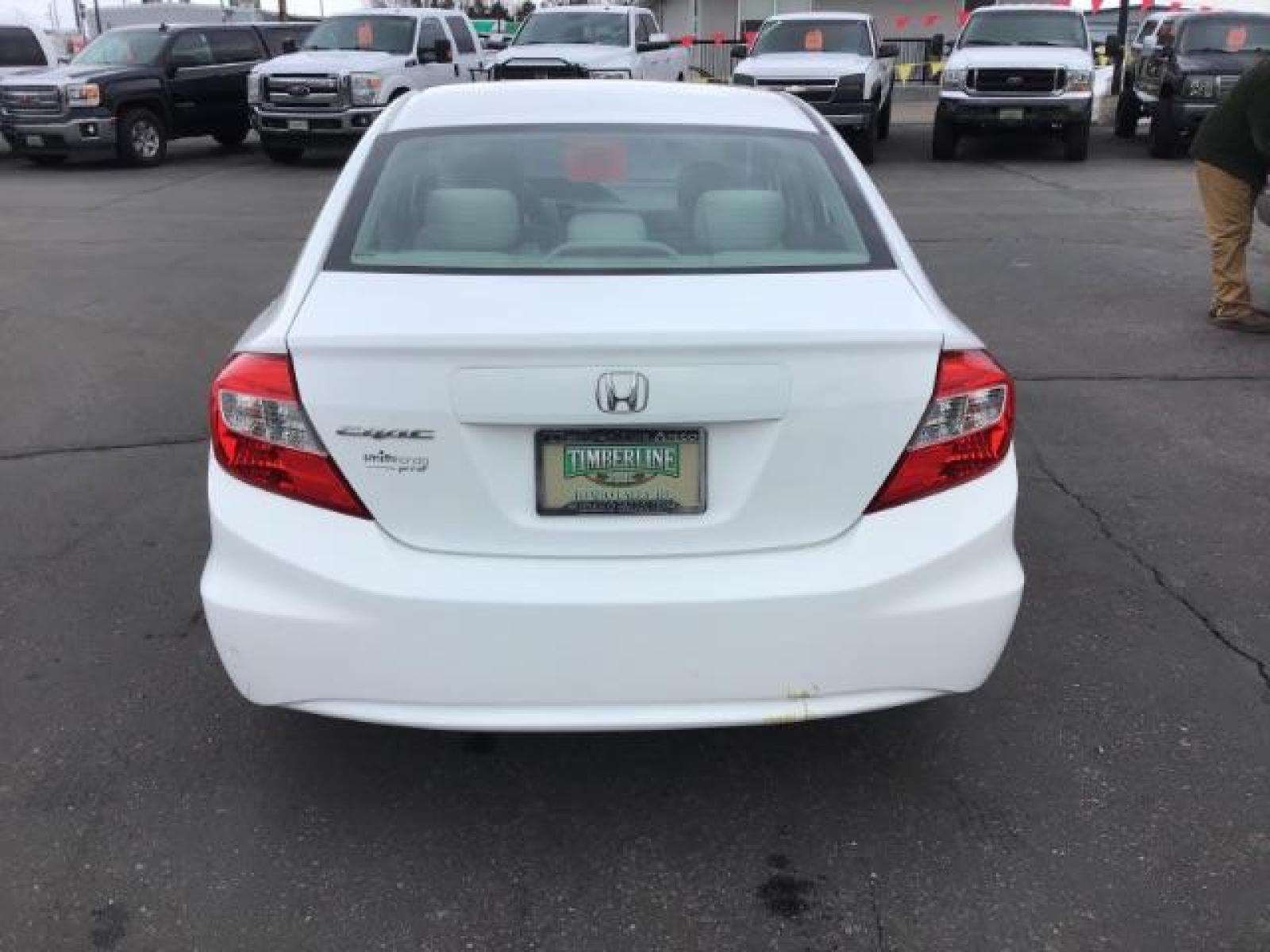 2012 Taffeta White /Gray Cloth Interior Honda Civic LX Sedan 5-Speed AT (19XFB2F54CE) with an 1.8L L4 SOHC 16V engine, 5-Speed Automatic transmission, located at 1235 N Woodruff Ave., Idaho Falls, 83401, (208) 523-1053, 43.507172, -112.000488 - This 2012 Honda Civic LX, has 98,000 miles. Comes with cloth interior, cruise control, power windows and locks, and AM/FM CD stereo. At Timberline Auto it is always easy to find a great deal on your next vehicle! Our experienced sales staff can help find the right vehicle will fit your needs. Our kn - Photo #3