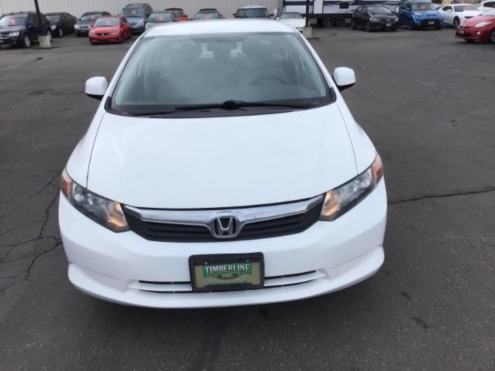 2012 Taffeta White /Gray Cloth Interior Honda Civic LX Sedan 5-Speed AT (19XFB2F54CE) with an 1.8L L4 SOHC 16V engine, 5-Speed Automatic transmission, located at 1235 N Woodruff Ave., Idaho Falls, 83401, (208) 523-1053, 43.507172, -112.000488 - This 2012 Honda Civic LX, has 98,000 miles. Comes with cloth interior, cruise control, power windows and locks, and AM/FM CD stereo. At Timberline Auto it is always easy to find a great deal on your next vehicle! Our experienced sales staff can help find the right vehicle will fit your needs. Our kn - Photo #7
