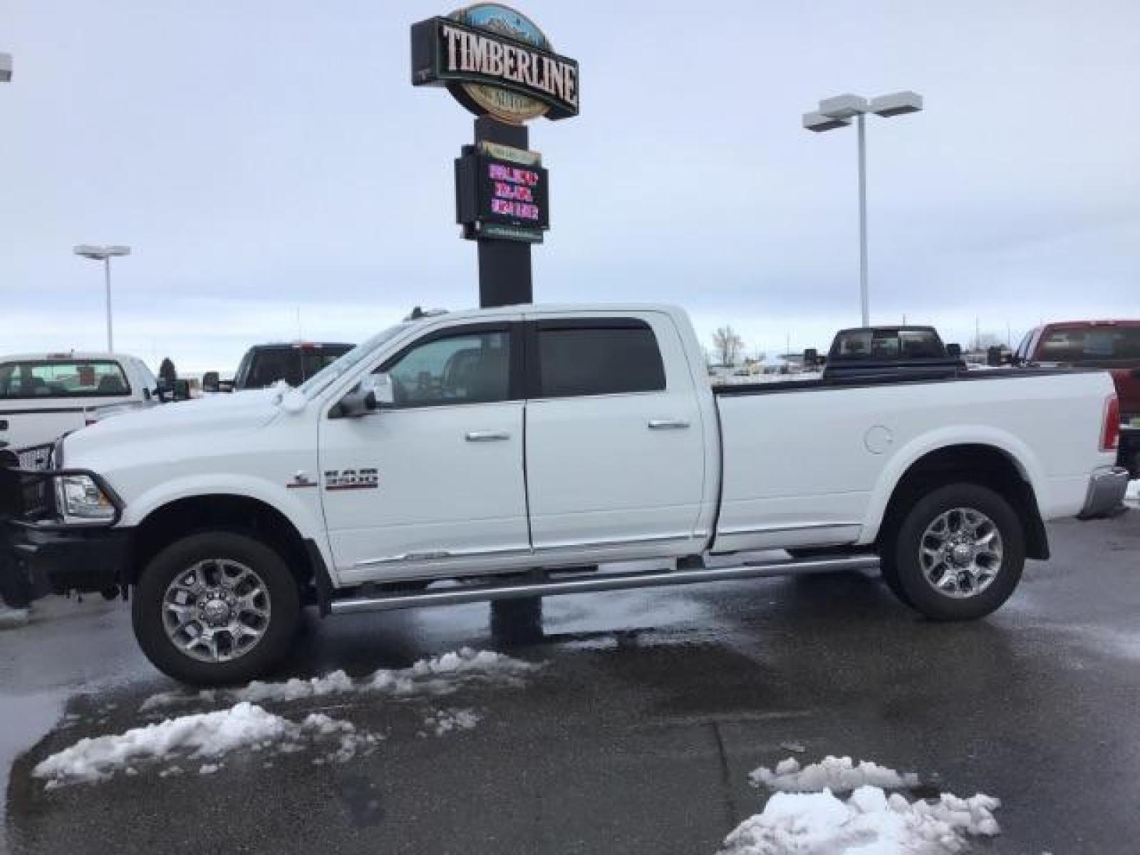 2017 Pearl White /Black/Cattle Tan, premium leather RAM 3500 Longhorn Crew Cab LWB 4WD (3C63R3KL4HG) with an 6.7L L6 OHV 24V TURBO DIESEL engine, 6-Speed Automatic transmission, located at 1235 N Woodruff Ave., Idaho Falls, 83401, (208) 523-1053, 43.507172, -112.000488 - This 2017 Ram 3500 Limited 4x4, has the 6.7L diesel motor. It has 99,000 miles. Comes with leather interior, heated and cooled seats, dual power seats, custom front bumper, back up camera, turnover ball, and blue tooth audio. At Timberline Auto it is always easy to find a great deal on your next ve - Photo #1