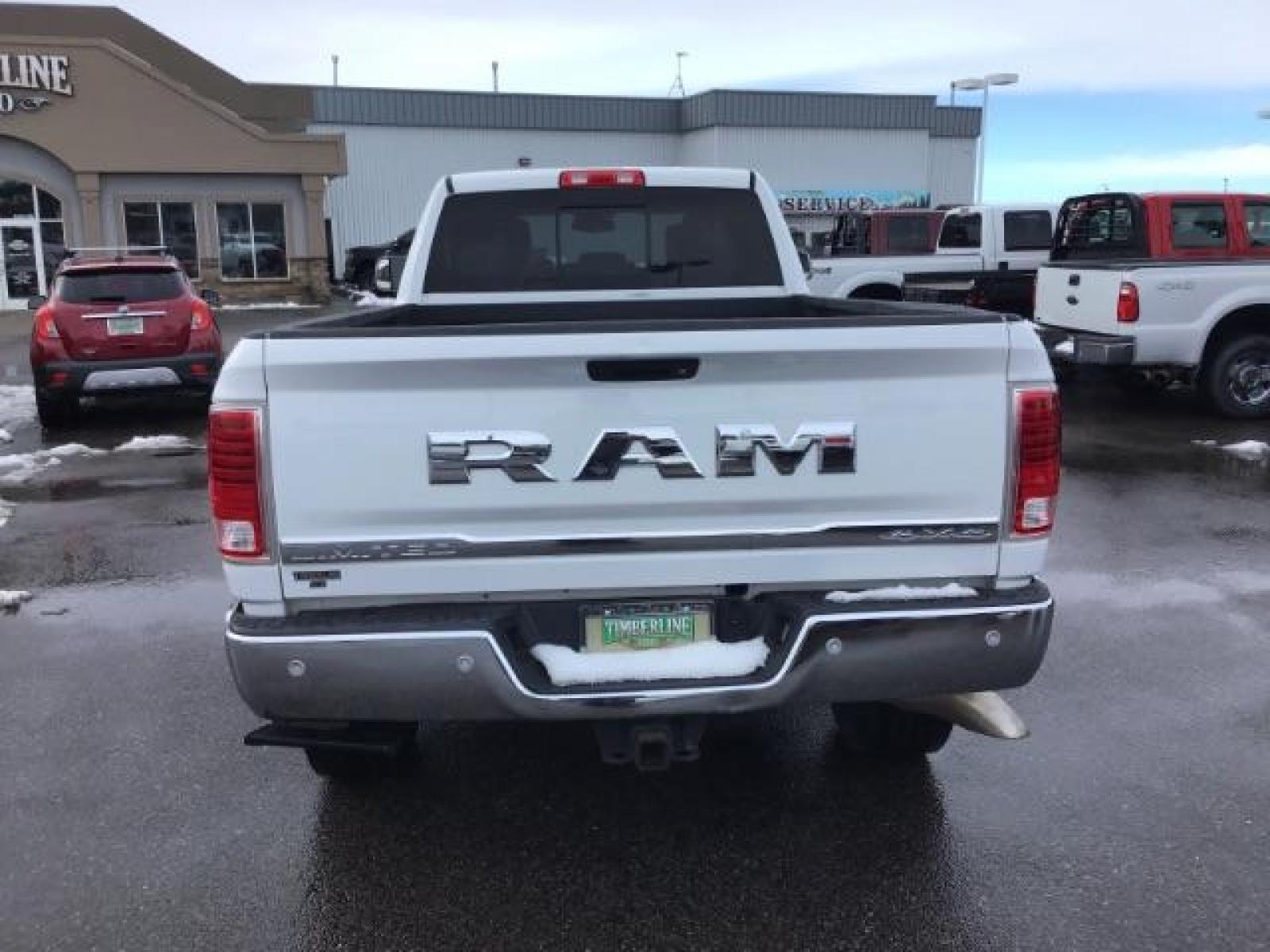2017 Pearl White /Black/Cattle Tan, premium leather RAM 3500 Longhorn Crew Cab LWB 4WD (3C63R3KL4HG) with an 6.7L L6 OHV 24V TURBO DIESEL engine, 6-Speed Automatic transmission, located at 1235 N Woodruff Ave., Idaho Falls, 83401, (208) 523-1053, 43.507172, -112.000488 - This 2017 Ram 3500 Limited 4x4, has the 6.7L diesel motor. It has 99,000 miles. Comes with leather interior, heated and cooled seats, dual power seats, custom front bumper, back up camera, turnover ball, and blue tooth audio. At Timberline Auto it is always easy to find a great deal on your next ve - Photo #3