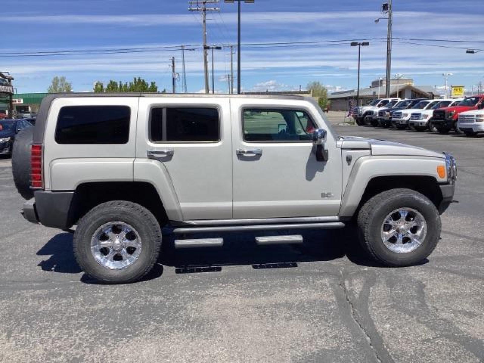 2006 Hummer H3 Sport Utility (5GTDN136268) with an 3.5L L5 DOHC 20V engine, located at 1235 N Woodruff Ave., Idaho Falls, 83401, (208) 523-1053, 43.507172, -112.000488 - The 2006 Hummer H3 was part of the Hummer lineup known for its rugged design and off-road capabilities. Here are some of its key features: Exterior Design: The H3 retained the iconic boxy design of the Hummer brand, with a rugged and aggressive appearance. It featured a wide stance and prominent wh - Photo #5