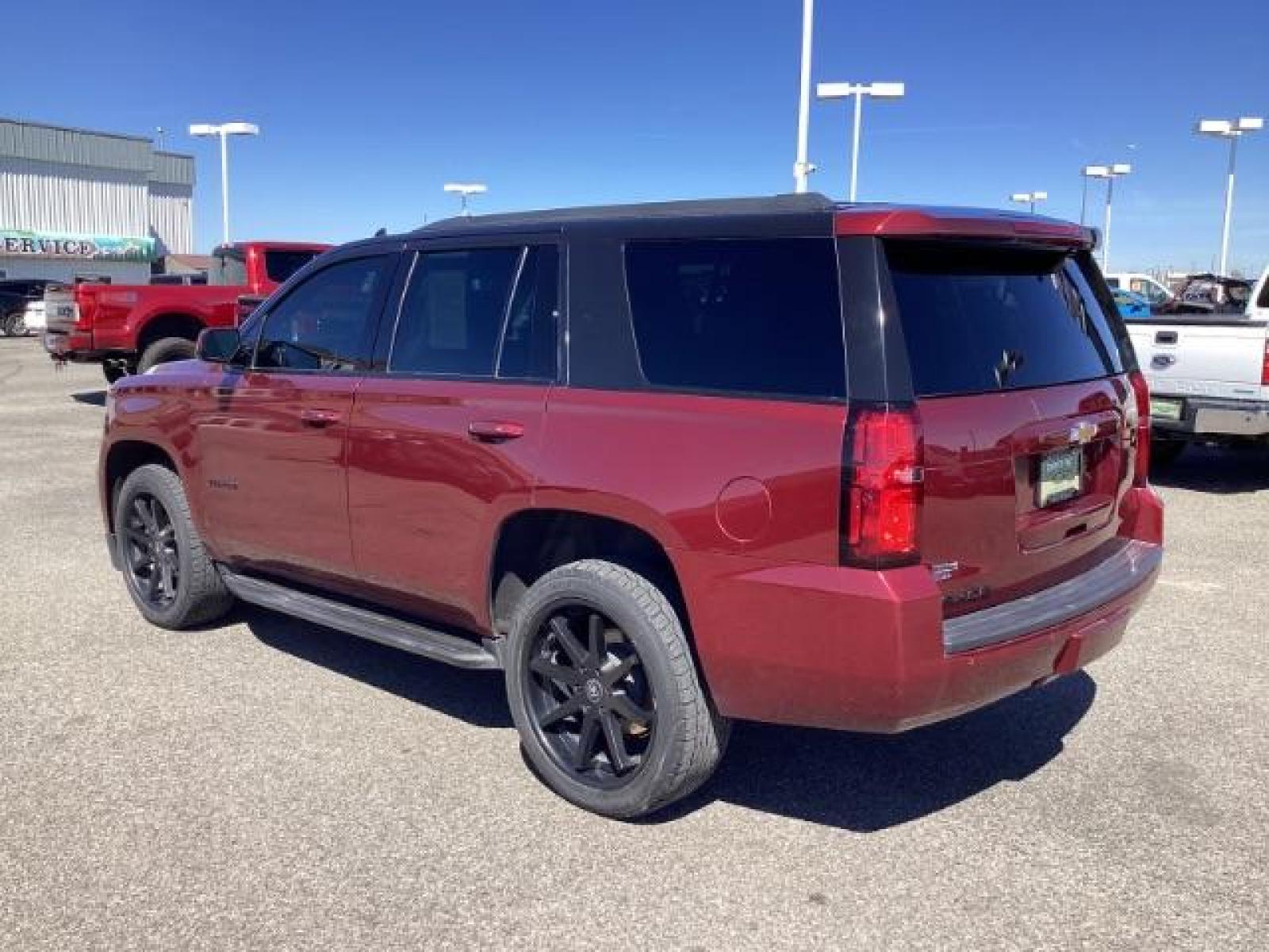 2020 Black Cherry Metallic /Jet Black, leather Chevrolet Tahoe LT 4WD (1GNSKBKC7LR) with an 5.3L V8 OHV 16V engine, 6-Speed Automatic transmission, located at 1235 N Woodruff Ave., Idaho Falls, 83401, (208) 523-1053, 43.507172, -112.000488 - The 2020 Chevrolet Tahoe LT is a well-equipped trim level of the popular full-size SUV. It comes with a range of features designed to provide comfort, convenience, safety, and performance. Here are some of the notable features you might find on the 2020 Chevy Tahoe LT: V8 Engine: The Tahoe LT typic - Photo #2