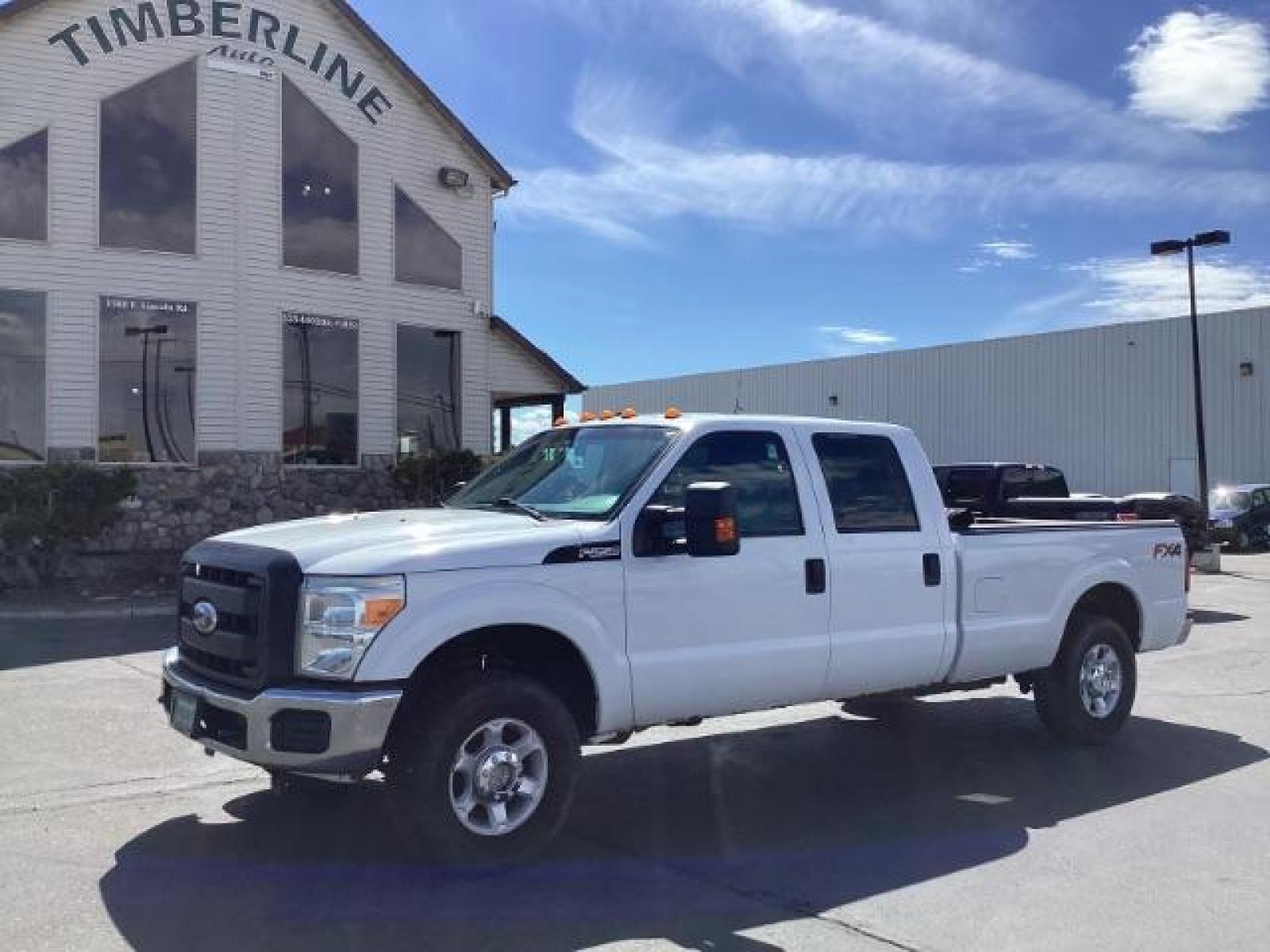 2012 Oxford White /Steel Cloth Interior Ford F-250 SD XL Crew Cab Long Bed 4WD (1FT7W2B64CE) with an 6.2L V8 OHV 16V engine, 6-Speed Automatic transmission, located at 1235 N Woodruff Ave., Idaho Falls, 83401, (208) 523-1053, 43.507172, -112.000488 - The 2011 Ford F-250 XL is a sturdy and capable truck designed for heavy-duty work. Here are the key features you can expect to find in the gas-powered XL trim: Engine Option: 6.2-liter V8 engine producing around 385 horsepower and 405 lb-ft of torque. Transmission: Most models come with a six-spe - Photo #0