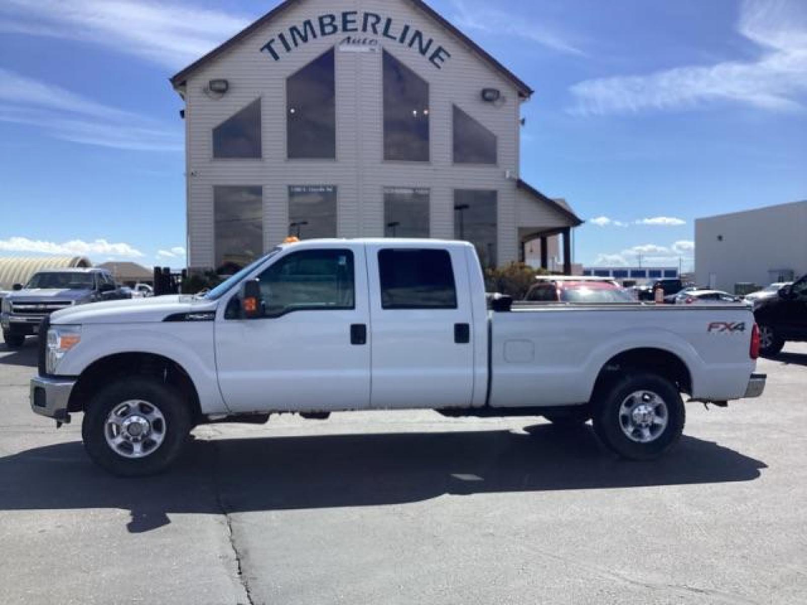 2012 Oxford White /Steel Cloth Interior Ford F-250 SD XL Crew Cab Long Bed 4WD (1FT7W2B64CE) with an 6.2L V8 OHV 16V engine, 6-Speed Automatic transmission, located at 1235 N Woodruff Ave., Idaho Falls, 83401, (208) 523-1053, 43.507172, -112.000488 - The 2011 Ford F-250 XL is a sturdy and capable truck designed for heavy-duty work. Here are the key features you can expect to find in the gas-powered XL trim: Engine Option: 6.2-liter V8 engine producing around 385 horsepower and 405 lb-ft of torque. Transmission: Most models come with a six-spe - Photo #1