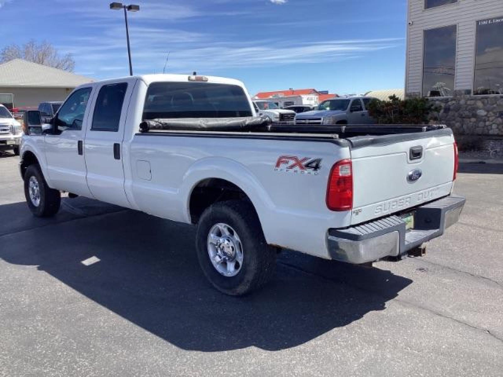 2012 Oxford White /Steel Cloth Interior Ford F-250 SD XL Crew Cab Long Bed 4WD (1FT7W2B64CE) with an 6.2L V8 OHV 16V engine, 6-Speed Automatic transmission, located at 1235 N Woodruff Ave., Idaho Falls, 83401, (208) 523-1053, 43.507172, -112.000488 - The 2011 Ford F-250 XL is a sturdy and capable truck designed for heavy-duty work. Here are the key features you can expect to find in the gas-powered XL trim: Engine Option: 6.2-liter V8 engine producing around 385 horsepower and 405 lb-ft of torque. Transmission: Most models come with a six-spe - Photo #2