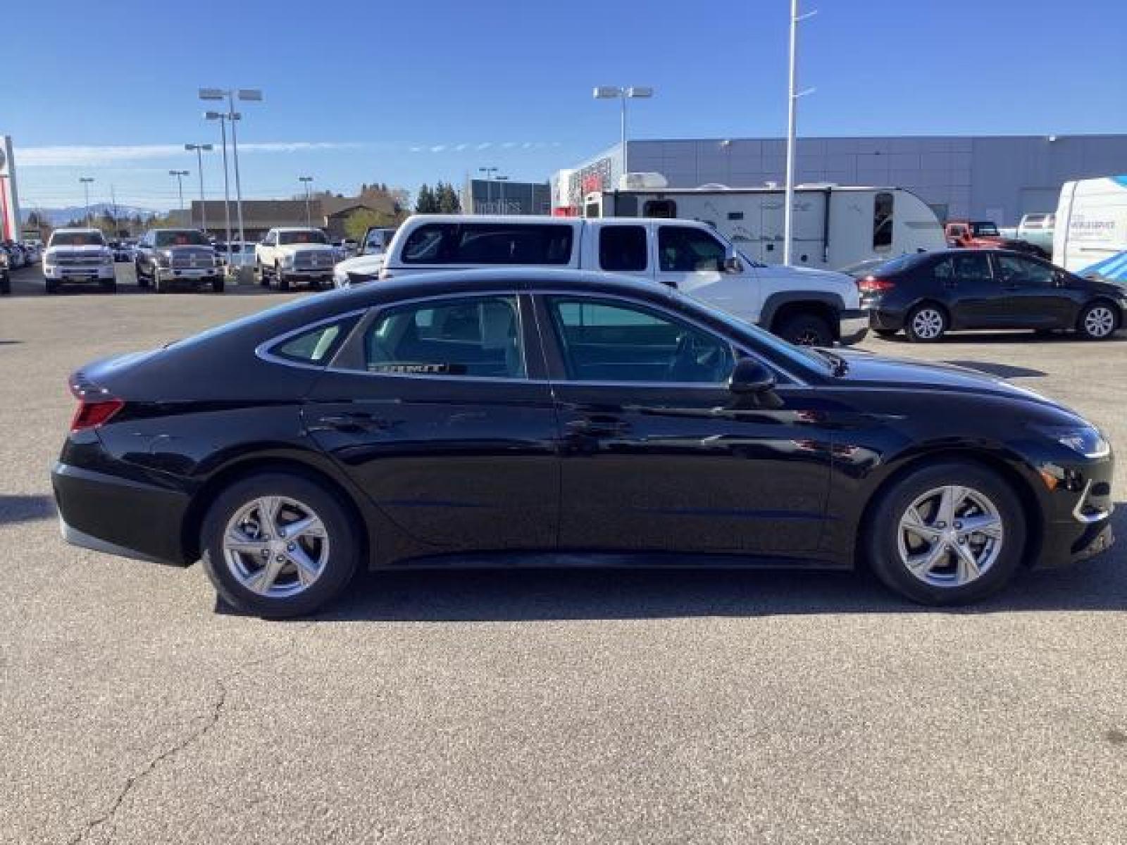2020 BLACK Hyundai Sonata SE (5NPEG4JA2LH) with an 2.5L L4 DOHC 16V engine, 8-Speed Automatic transmission, located at 1235 N Woodruff Ave., Idaho Falls, 83401, (208) 523-1053, 43.507172, -112.000488 - The 2020 Sonata featured a completely redesigned exterior, characterized by a sleek coupe-like profile and Hyundai's Sensuous Sportiness design philosophy. It had a prominent front grille, LED headlights, and a fastback-style roofline, giving it a more upscale and dynamic appearance compared to its - Photo #6