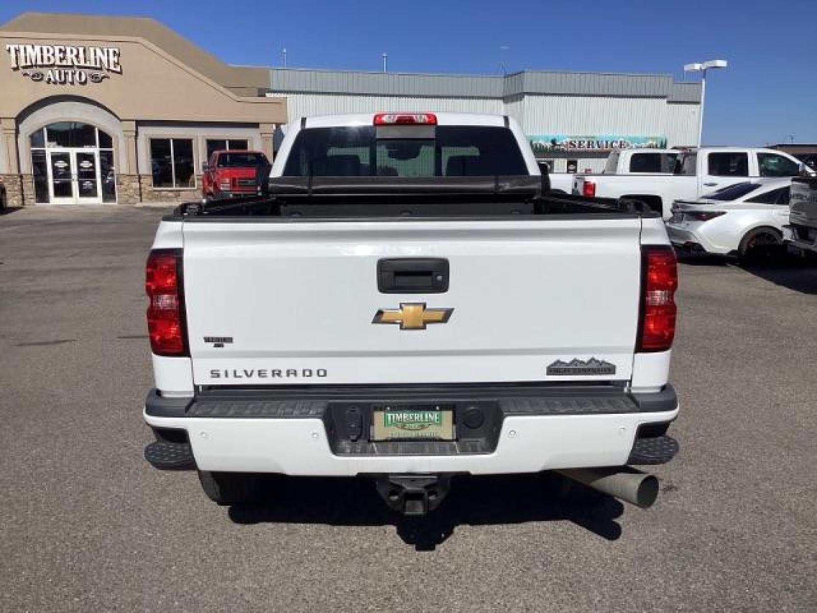 2015 Summit White /Jet Black Chevrolet Silverado 2500HD LT Crew Cab 4WD (1GC1KXE81FF) with an 6.6L V8 OHV 32V TURBO DIESEL engine, 6-Speed Automatic transmission, located at 1235 N Woodruff Ave., Idaho Falls, 83401, (208) 523-1053, 43.507172, -112.000488 - The 2015 Chevrolet Silverado 2500HD High Country Diesel is a top-of-the-line trim level of the Silverado heavy-duty pickup truck, offering a blend of luxury, capability, and advanced technology. Here are some key features you might find on the 2015 Chevrolet Silverado 2500HD High Country Diesel: Dur - Photo #3