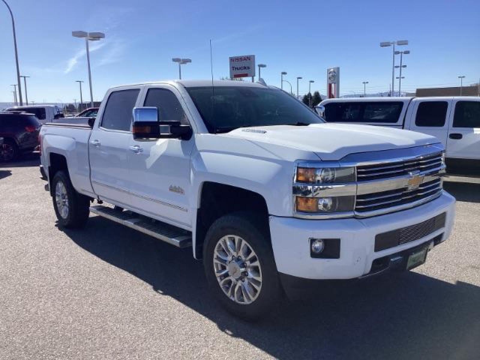 2015 Summit White /Jet Black Chevrolet Silverado 2500HD LT Crew Cab 4WD (1GC1KXE81FF) with an 6.6L V8 OHV 32V TURBO DIESEL engine, 6-Speed Automatic transmission, located at 1235 N Woodruff Ave., Idaho Falls, 83401, (208) 523-1053, 43.507172, -112.000488 - The 2015 Chevrolet Silverado 2500HD High Country Diesel is a top-of-the-line trim level of the Silverado heavy-duty pickup truck, offering a blend of luxury, capability, and advanced technology. Here are some key features you might find on the 2015 Chevrolet Silverado 2500HD High Country Diesel: Dur - Photo #6