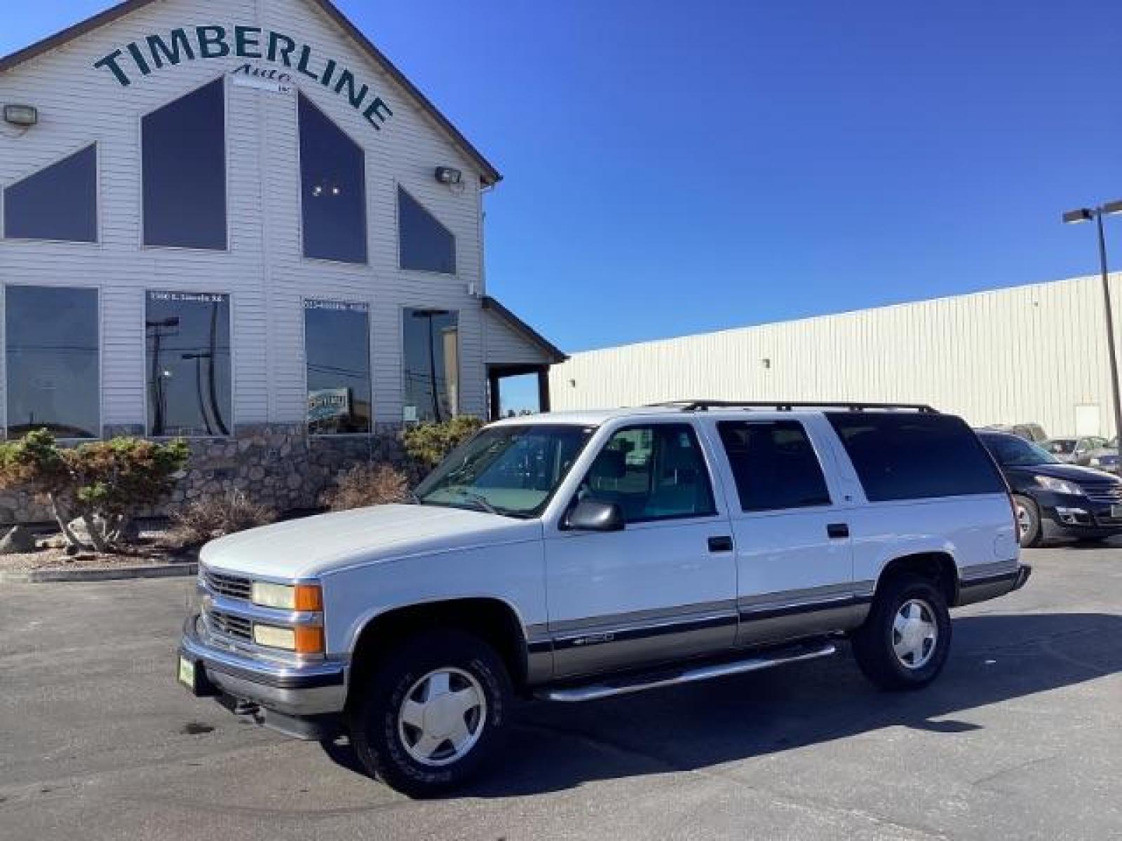 1999 Chevrolet Suburban K1500 4WD (1GNFK16R8XJ) with an 5.7L V8 OHV 16V engine, 4-Speed Automatic transmission, located at 1235 N Woodruff Ave., Idaho Falls, 83401, (208) 523-1053, 43.507172, -112.000488 - The 1999 Chevrolet Suburban LS was a rugged and versatile full-size SUV that offered a range of features suitable for families, towing, and outdoor activities. Here are some of the key features you might find on the 1999 Chevrolet Suburban LS: V8 Engine: Typically equipped with a powerful V8 engine - Photo #0