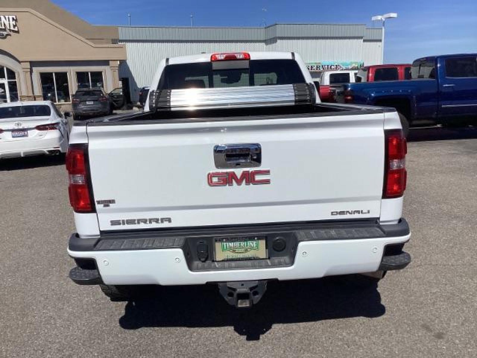 2016 Summit White /Cocoa/Dune, leather GMC Sierra 2500HD Denali Crew Cab 4WD (1GT12UE83GF) with an 6.6L V8 OHV 16 DIESEL engine, 6-Speed Automatic transmission, located at 1235 N Woodruff Ave., Idaho Falls, 83401, (208) 523-1053, 43.507172, -112.000488 - The 2016 GMC Sierra Denali 6.6L typically offers a combination of power, luxury, and capability. Here are some of the key features you can expect to find in this model: Engine: The 6.6-liter V8 turbo diesel engine is one of the standout features of the Sierra Denali. This engine delivers robust per - Photo #3