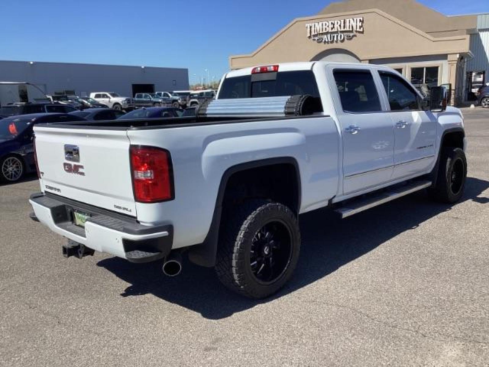 2016 Summit White /Cocoa/Dune, leather GMC Sierra 2500HD Denali Crew Cab 4WD (1GT12UE83GF) with an 6.6L V8 OHV 16 DIESEL engine, 6-Speed Automatic transmission, located at 1235 N Woodruff Ave., Idaho Falls, 83401, (208) 523-1053, 43.507172, -112.000488 - The 2016 GMC Sierra Denali 6.6L typically offers a combination of power, luxury, and capability. Here are some of the key features you can expect to find in this model: Engine: The 6.6-liter V8 turbo diesel engine is one of the standout features of the Sierra Denali. This engine delivers robust per - Photo #4