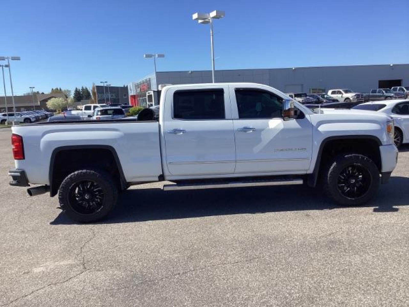 2016 Summit White /Cocoa/Dune, leather GMC Sierra 2500HD Denali Crew Cab 4WD (1GT12UE83GF) with an 6.6L V8 OHV 16 DIESEL engine, 6-Speed Automatic transmission, located at 1235 N Woodruff Ave., Idaho Falls, 83401, (208) 523-1053, 43.507172, -112.000488 - The 2016 GMC Sierra Denali 6.6L typically offers a combination of power, luxury, and capability. Here are some of the key features you can expect to find in this model: Engine: The 6.6-liter V8 turbo diesel engine is one of the standout features of the Sierra Denali. This engine delivers robust per - Photo #5