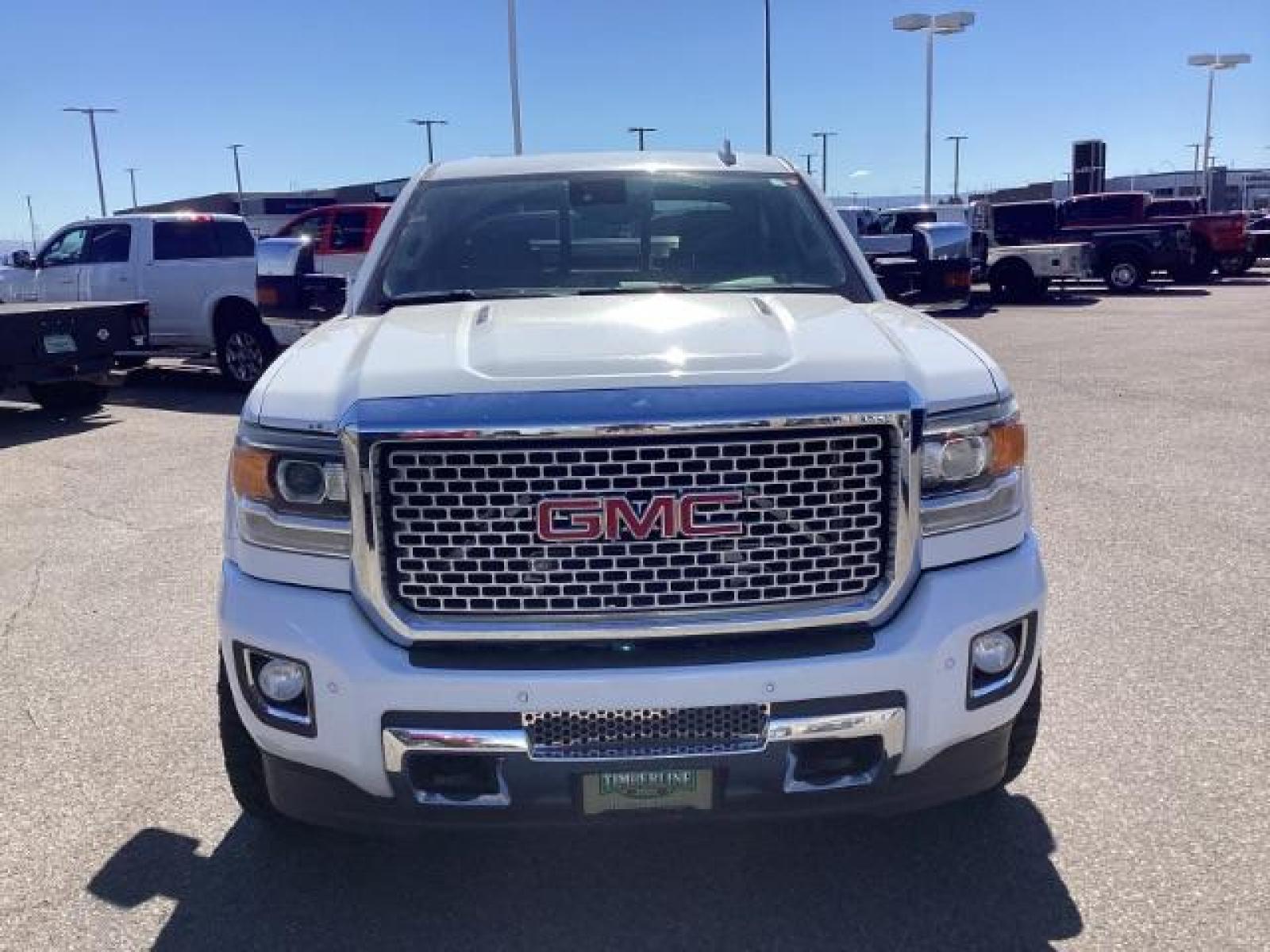 2016 Summit White /Cocoa/Dune, leather GMC Sierra 2500HD Denali Crew Cab 4WD (1GT12UE83GF) with an 6.6L V8 OHV 16 DIESEL engine, 6-Speed Automatic transmission, located at 1235 N Woodruff Ave., Idaho Falls, 83401, (208) 523-1053, 43.507172, -112.000488 - The 2016 GMC Sierra Denali 6.6L typically offers a combination of power, luxury, and capability. Here are some of the key features you can expect to find in this model: Engine: The 6.6-liter V8 turbo diesel engine is one of the standout features of the Sierra Denali. This engine delivers robust per - Photo #7