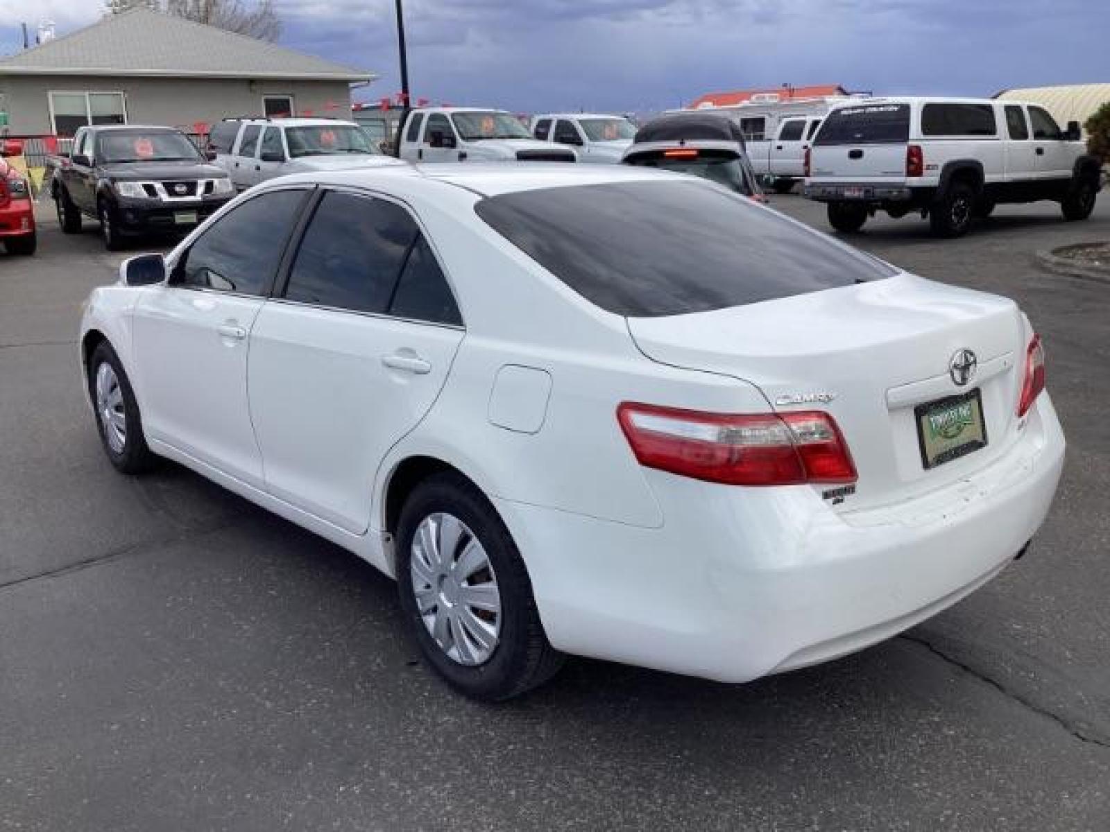 2008 Super White /Ash Cloth Interior Toyota Camry LE 5-Spd AT (4T4BE46K48R) with an 2.4L L4 DOHC 16V engine, 5-Speed Automatic transmission, located at 1235 N Woodruff Ave., Idaho Falls, 83401, (208) 523-1053, 43.507172, -112.000488 - The 2008 Toyota Camry LE is a midsize sedan known for its reliability, comfort, and practicality. Here are the key features you might find on the 2008 Toyota Camry LE: Engine: Typically equipped with a 2.4-liter inline-four engine producing around 158 horsepower and 161 lb-ft of torque, paired with - Photo #2