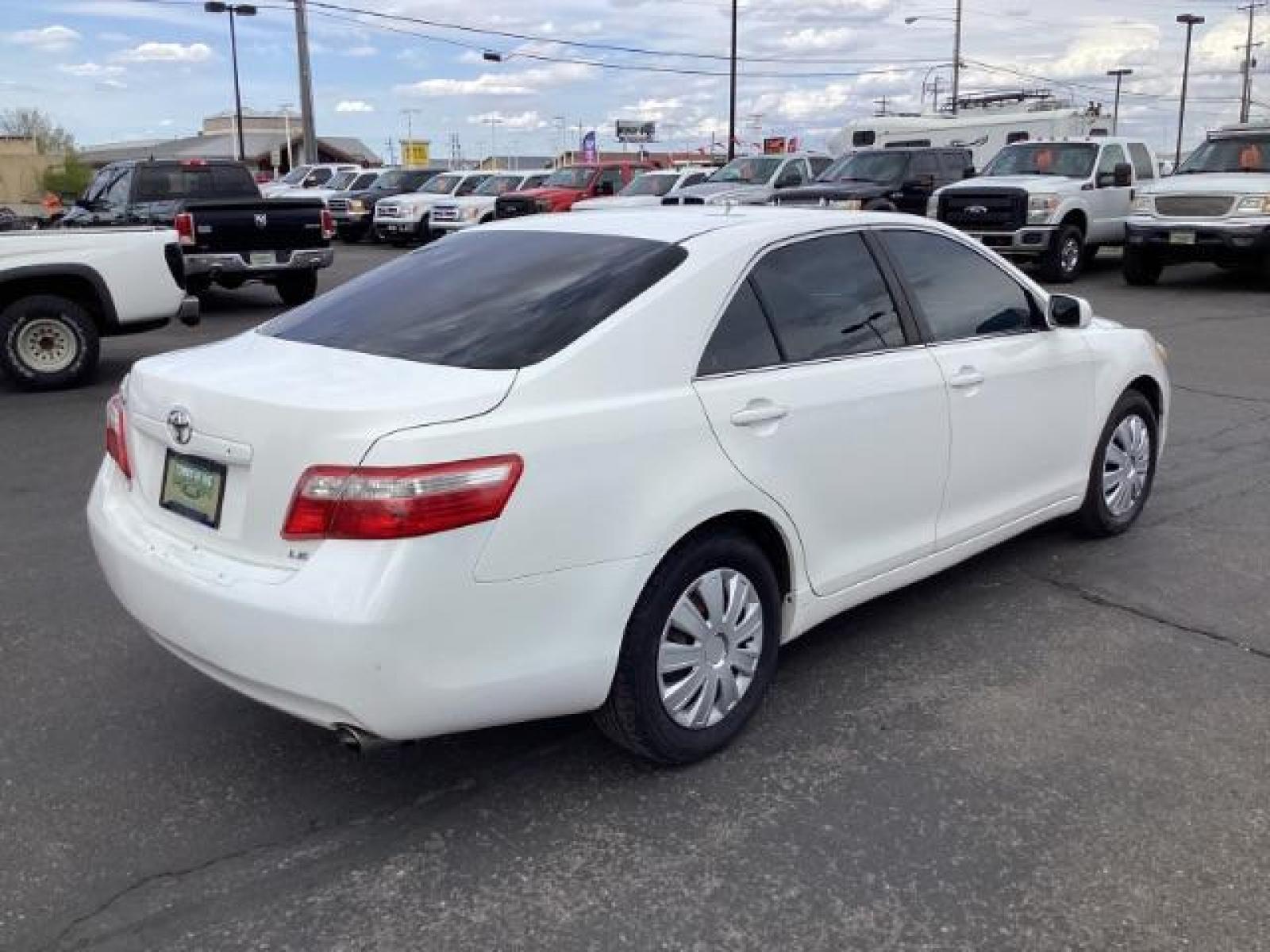 2008 Super White /Ash Cloth Interior Toyota Camry LE 5-Spd AT (4T4BE46K48R) with an 2.4L L4 DOHC 16V engine, 5-Speed Automatic transmission, located at 1235 N Woodruff Ave., Idaho Falls, 83401, (208) 523-1053, 43.507172, -112.000488 - The 2008 Toyota Camry LE is a midsize sedan known for its reliability, comfort, and practicality. Here are the key features you might find on the 2008 Toyota Camry LE: Engine: Typically equipped with a 2.4-liter inline-four engine producing around 158 horsepower and 161 lb-ft of torque, paired with - Photo #4