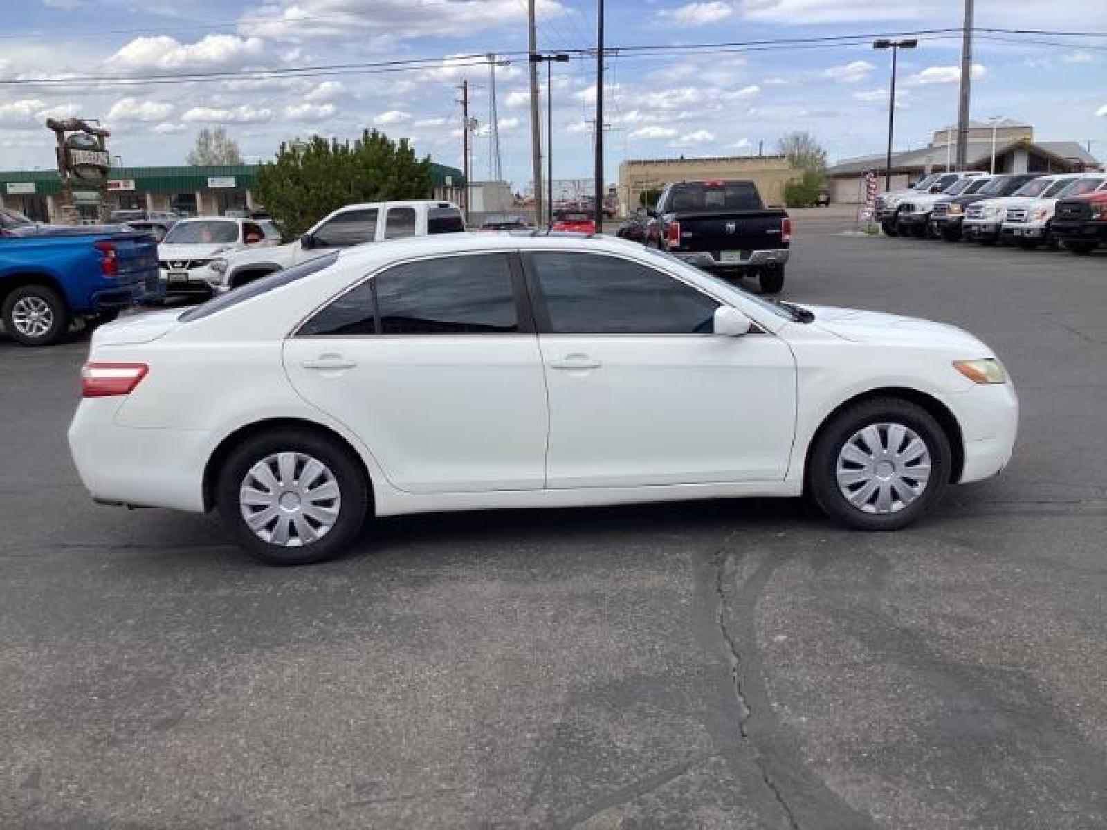 2008 Super White /Ash Cloth Interior Toyota Camry LE 5-Spd AT (4T4BE46K48R) with an 2.4L L4 DOHC 16V engine, 5-Speed Automatic transmission, located at 1235 N Woodruff Ave., Idaho Falls, 83401, (208) 523-1053, 43.507172, -112.000488 - The 2008 Toyota Camry LE is a midsize sedan known for its reliability, comfort, and practicality. Here are the key features you might find on the 2008 Toyota Camry LE: Engine: Typically equipped with a 2.4-liter inline-four engine producing around 158 horsepower and 161 lb-ft of torque, paired with - Photo #5