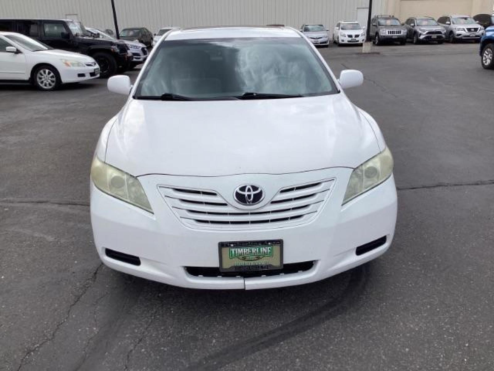 2008 Super White /Ash Cloth Interior Toyota Camry LE 5-Spd AT (4T4BE46K48R) with an 2.4L L4 DOHC 16V engine, 5-Speed Automatic transmission, located at 1235 N Woodruff Ave., Idaho Falls, 83401, (208) 523-1053, 43.507172, -112.000488 - The 2008 Toyota Camry LE is a midsize sedan known for its reliability, comfort, and practicality. Here are the key features you might find on the 2008 Toyota Camry LE: Engine: Typically equipped with a 2.4-liter inline-four engine producing around 158 horsepower and 161 lb-ft of torque, paired with - Photo #7