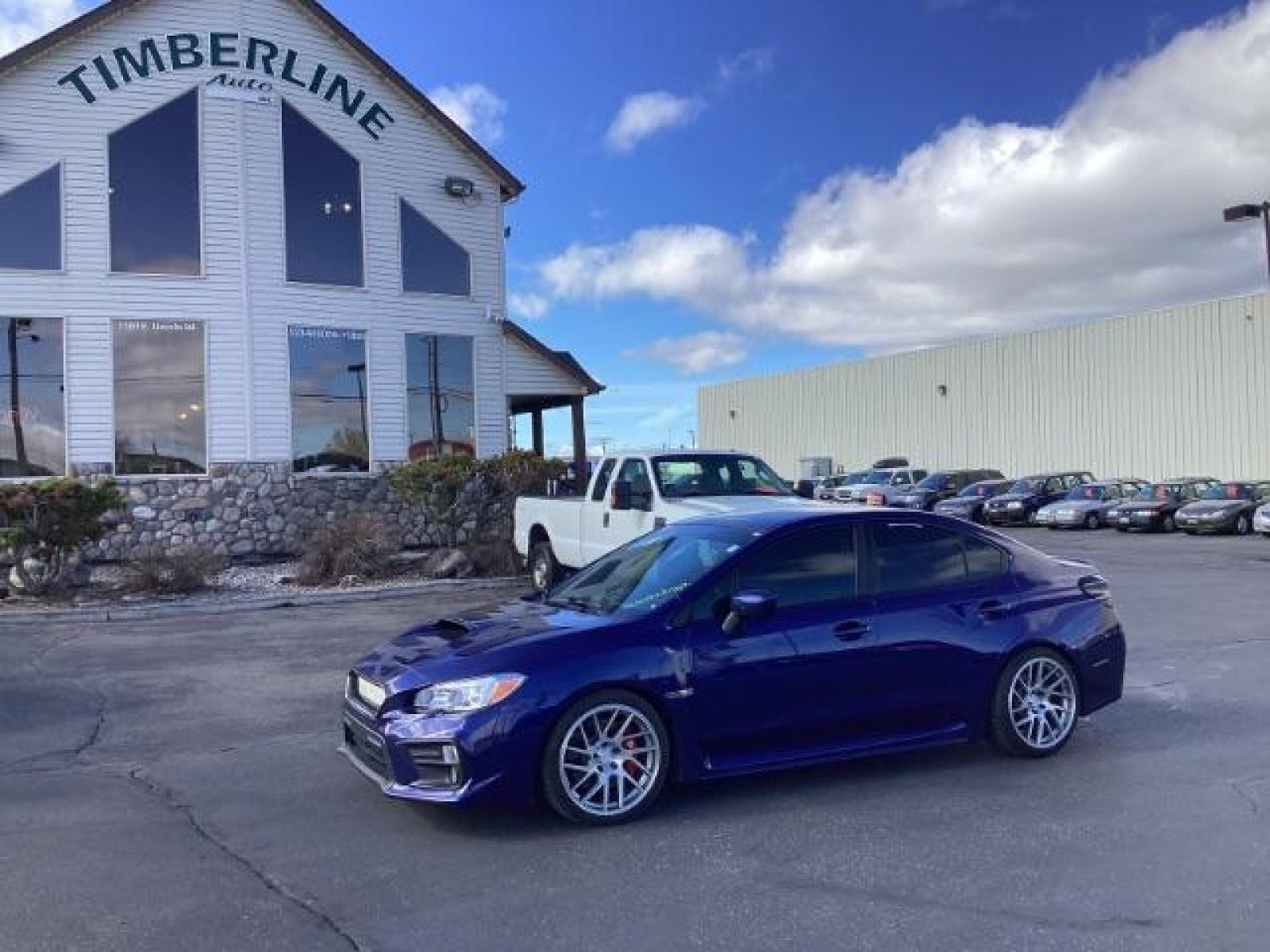 2020 WR Blue Pearl /Black/Carbon Black, leather/sueded microfiber Subaru WRX Premium 6M (JF1VA1B60L9) with an 2.0L H4 DOHC 16V engine, 6-Speed Manual transmission, located at 1235 N Woodruff Ave., Idaho Falls, 83401, (208) 523-1053, 43.507172, -112.000488 - The 2020 Subaru WRX Premium offers a blend of performance, handling, and modern features tailored for enthusiasts. Here are some key features you can typically find in the 2020 Subaru WRX Premium: Turbocharged Engine: The WRX Premium is usually powered by a 2.0-liter turbocharged four-cylinder Boxe - Photo #0