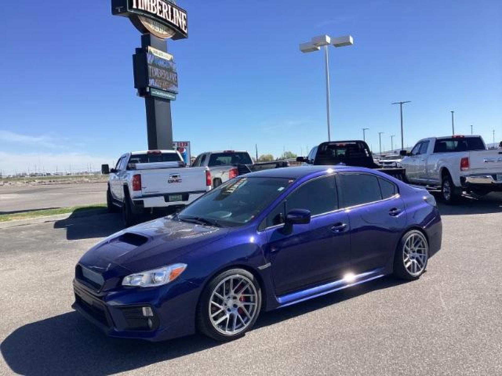 2020 WR Blue Pearl /Black/Carbon Black, leather/sueded microfiber Subaru WRX Premium 6M (JF1VA1B60L9) with an 2.0L H4 DOHC 16V engine, 6-Speed Manual transmission, located at 1235 N Woodruff Ave., Idaho Falls, 83401, (208) 523-1053, 43.507172, -112.000488 - The 2020 Subaru WRX Premium offers a blend of performance, handling, and modern features tailored for enthusiasts. Here are some key features you can typically find in the 2020 Subaru WRX Premium: Turbocharged Engine: The WRX Premium is usually powered by a 2.0-liter turbocharged four-cylinder Boxe - Photo #1