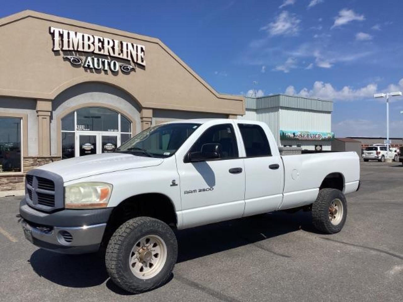 2006 Bright White /Medium Slate Gray Cloth Interior Dodge Ram 2500 ST Quad Cab Long Bed 4WD (1D7KS28C96J) with an 5.9L L6 OHV 24V TURBO DIESEL engine, 5-Speed Automatic transmission, located at 1235 N Woodruff Ave., Idaho Falls, 83401, (208) 523-1053, 43.507172, -112.000488 - Photo #0